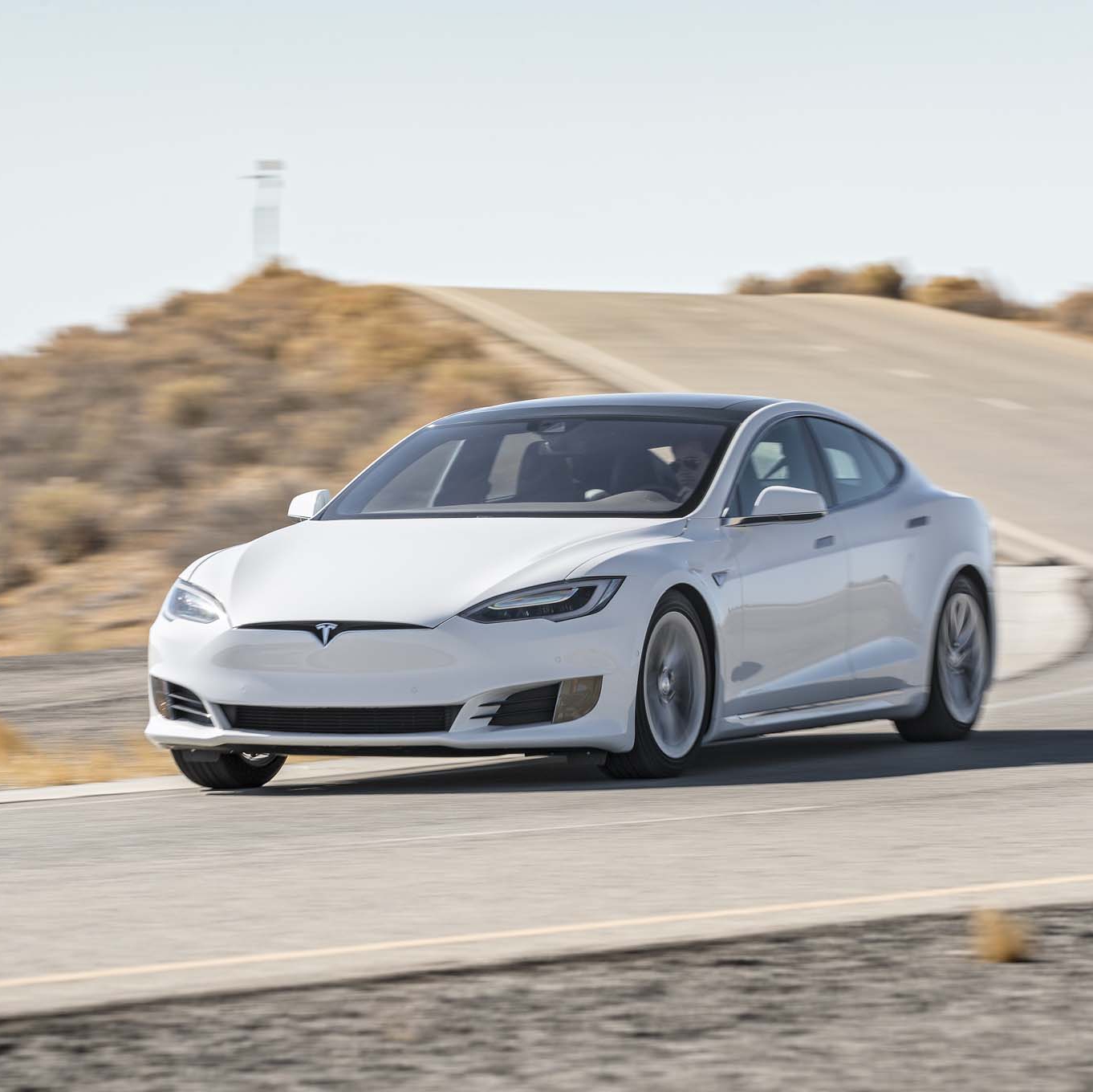 ?Компания Tesla?...