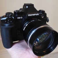Корпорация Olympus...