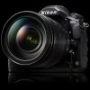 Компания Nikon...
